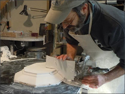 Daniel Mehlman making a mold