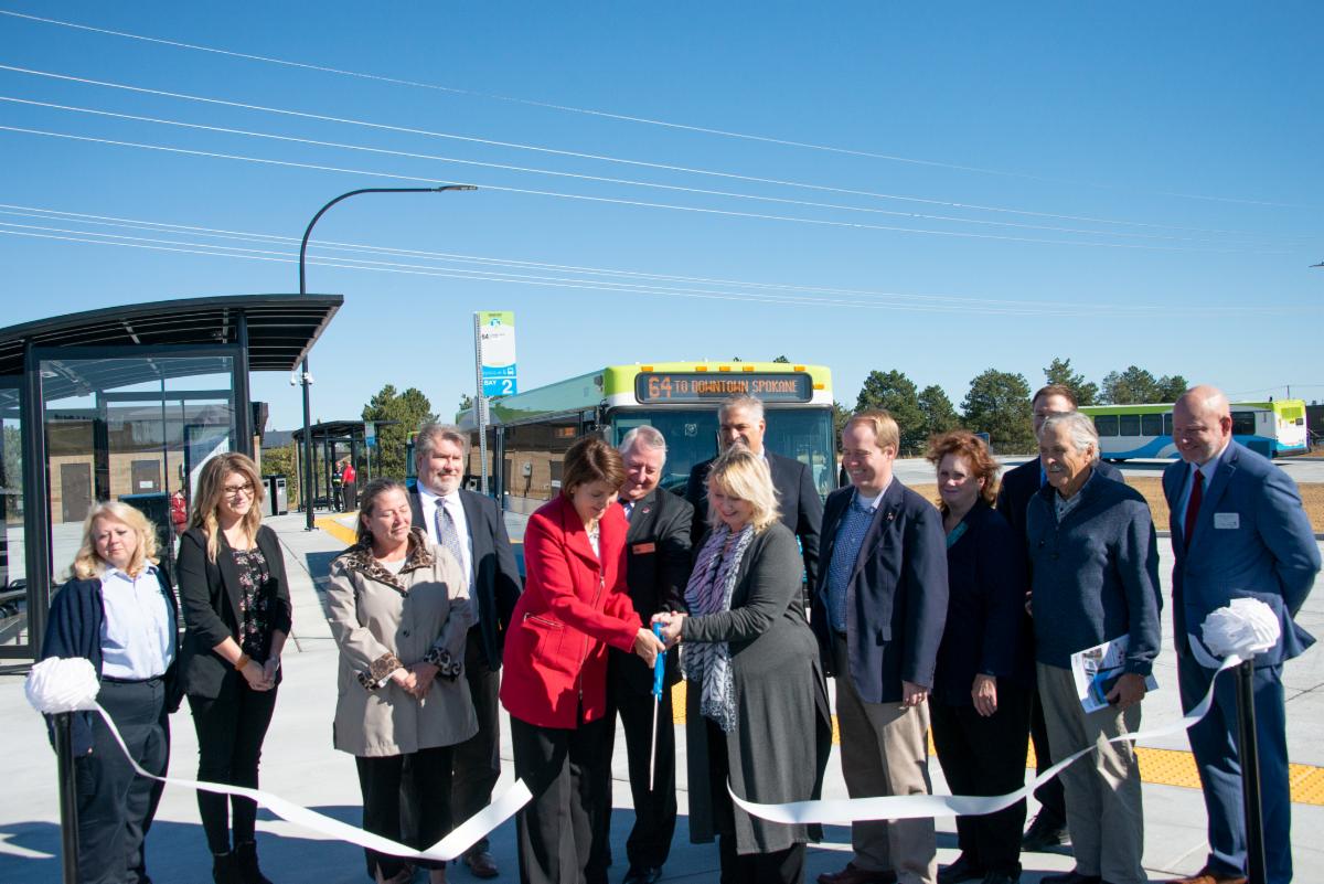 A photo of Susan at a ribbon cutting event