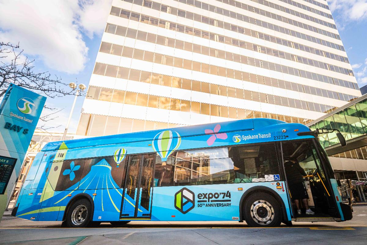 A photo of a bus with the new Expo '74-themed livery for Routes 11 and 12