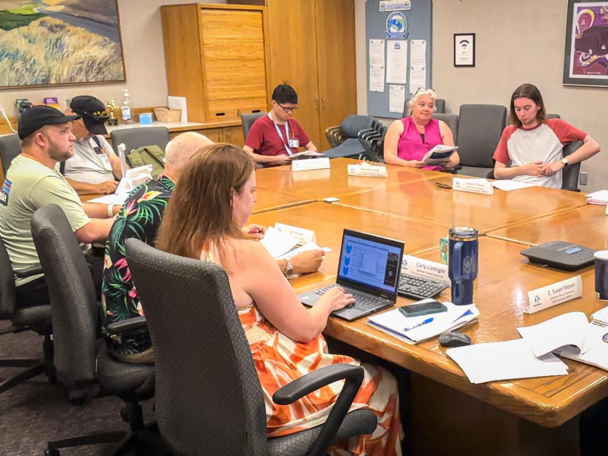 A photo of the Citizen Advisory Committee meeting in an STA conference room.