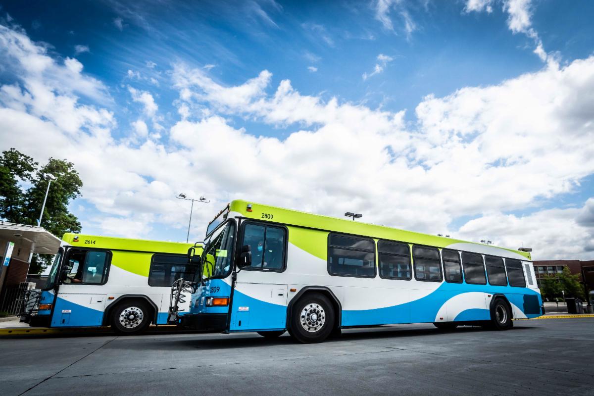A photo of two buses at SCC Transit Center