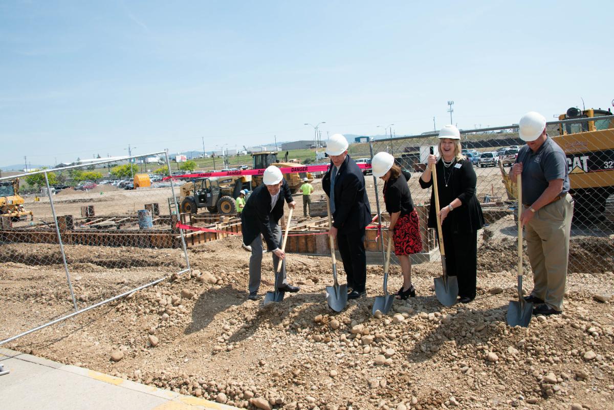 A photo of Susan and others at a groundbreaking