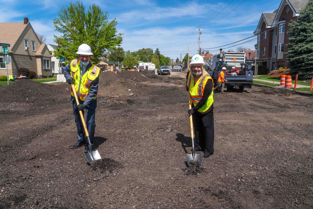 A photo of Susan at a construction site for a City Line stop