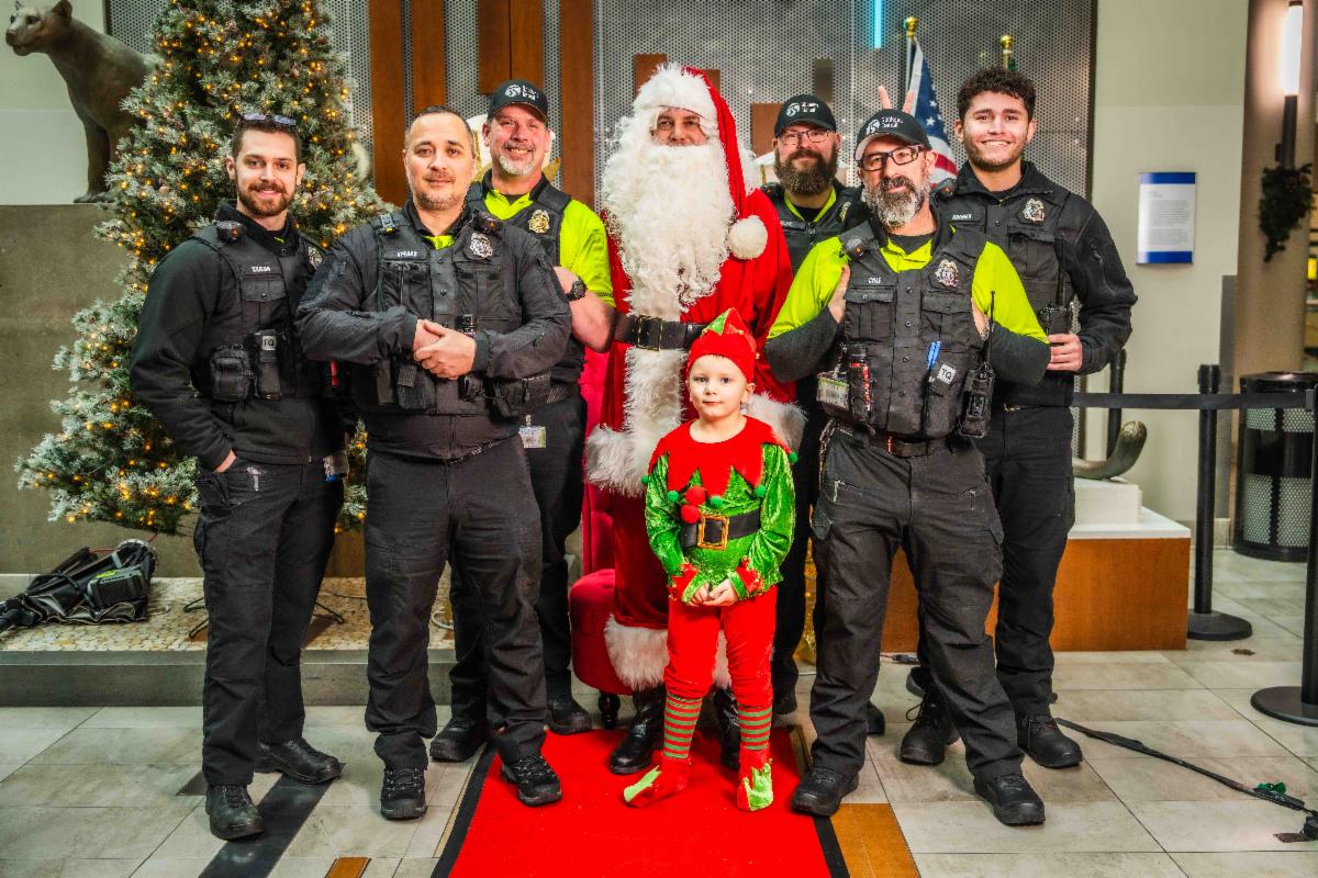 A photo of the Plaza's security team posing with Santa