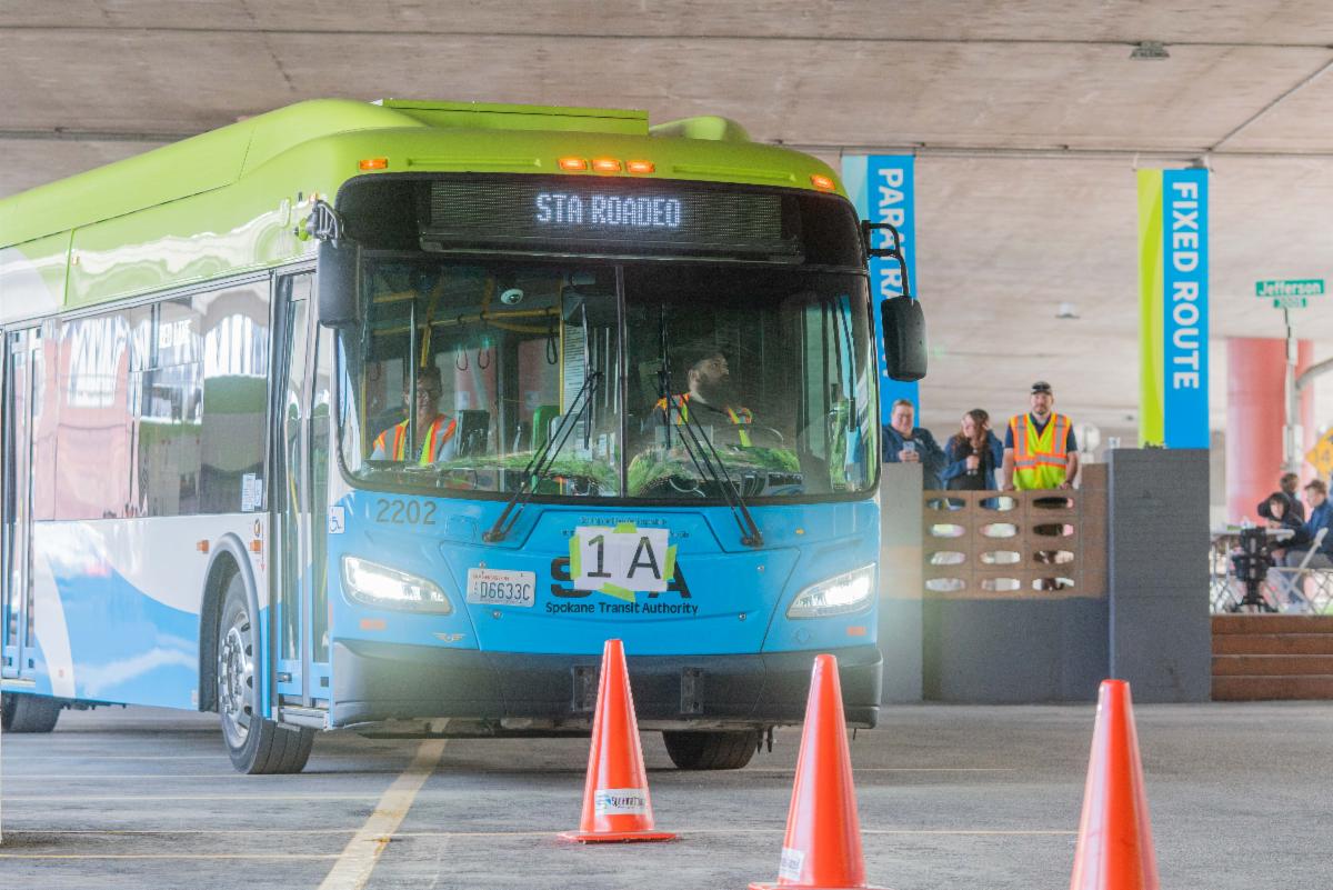 A photo of an STA bus participating in the Roadeo with orange cones forming the course