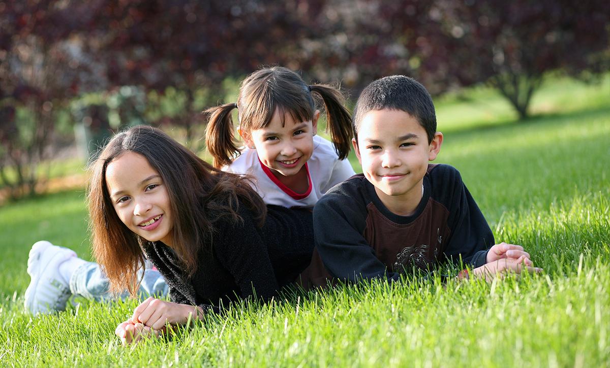 Native children on grass