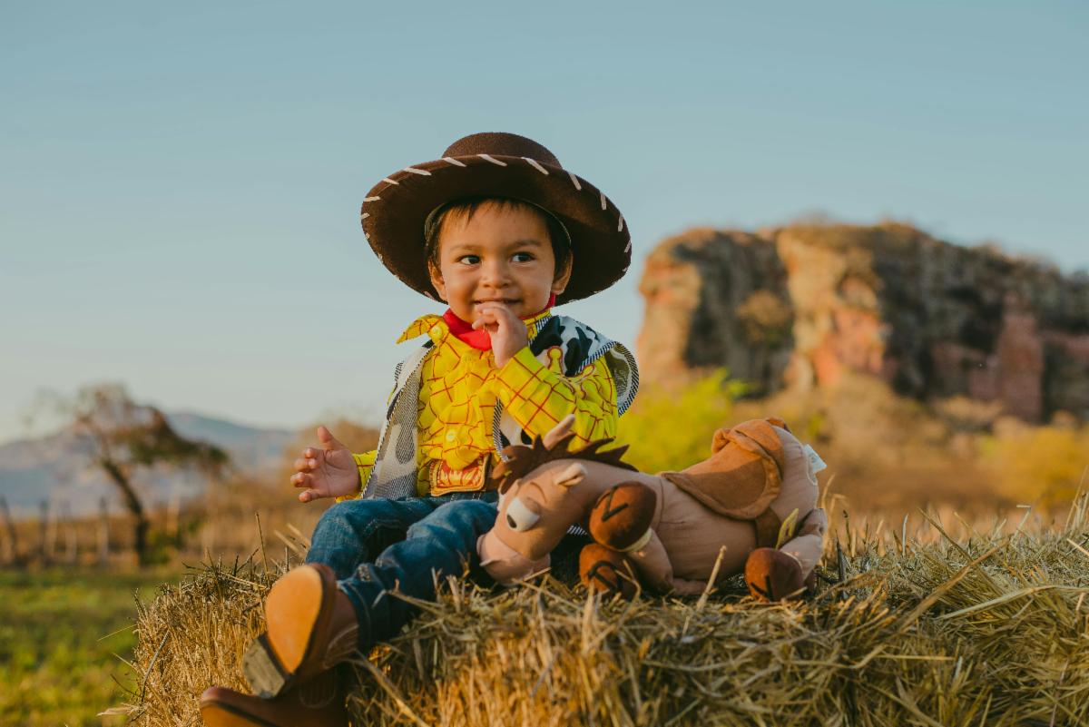 Young child in cowboy costume