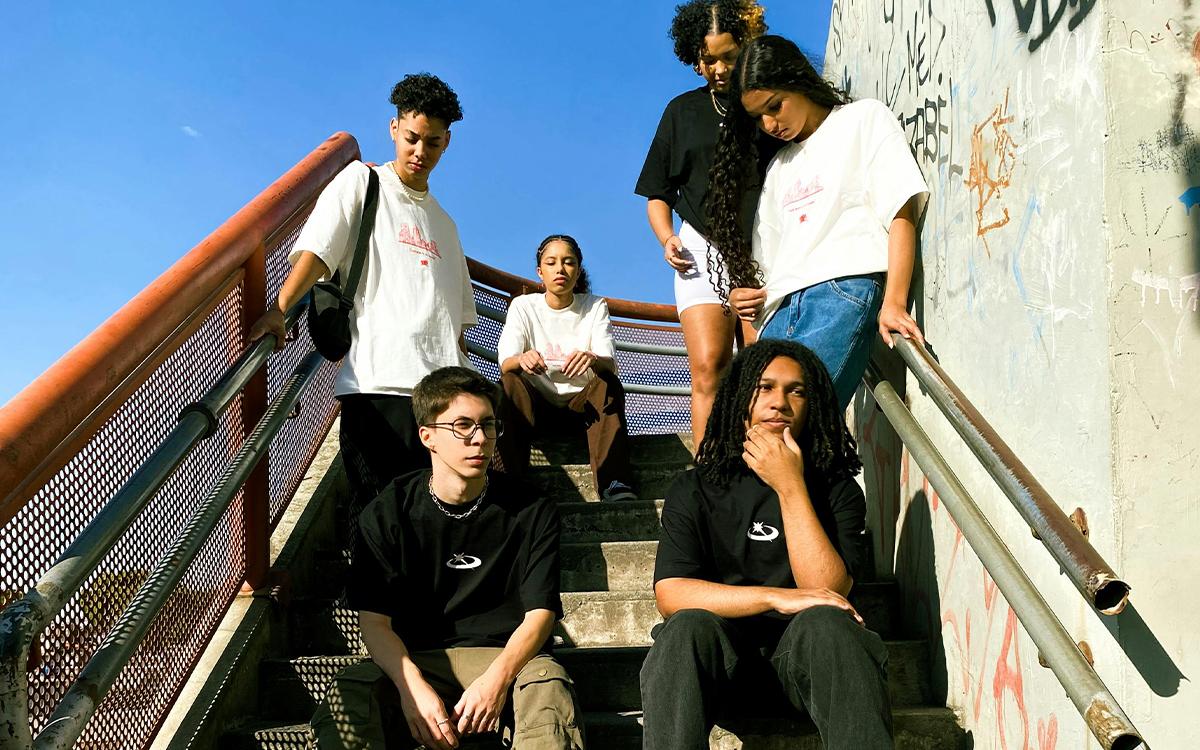 Teens hanging around a public stairwell.