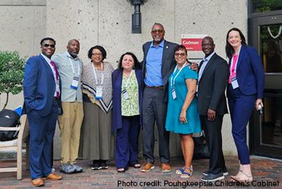 Older kids marching in the park.