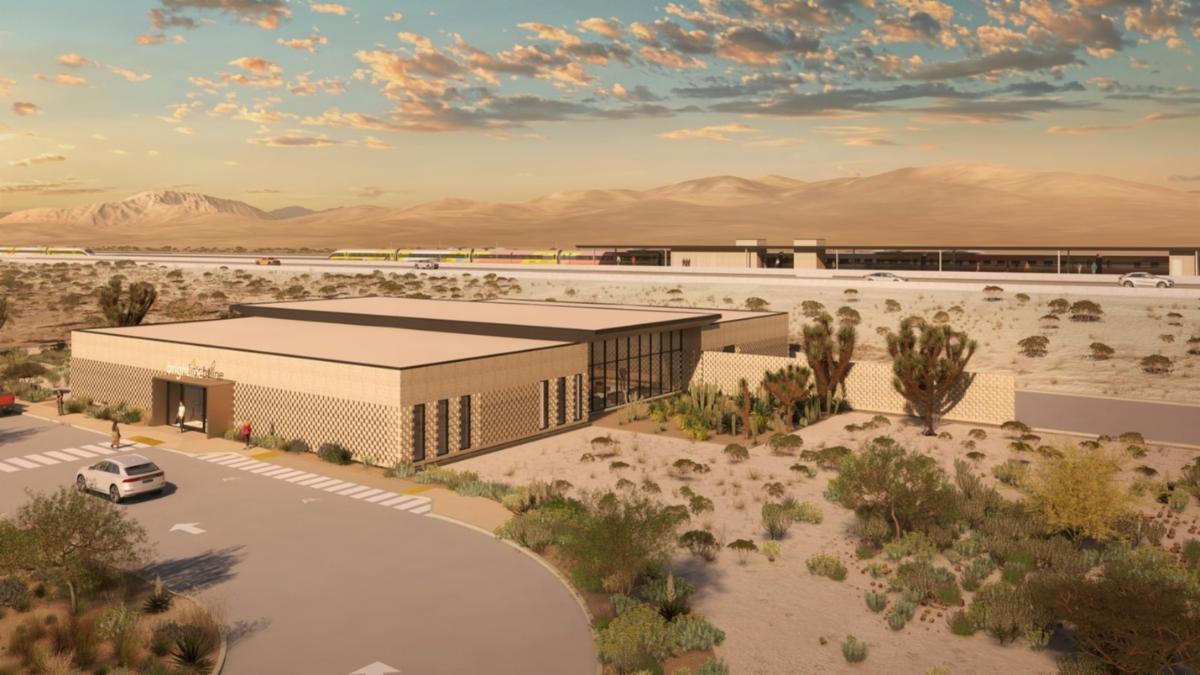 Rendering of Town of Apple Valley future Brightline West station that includes a building with desert landscape surrounding it. 