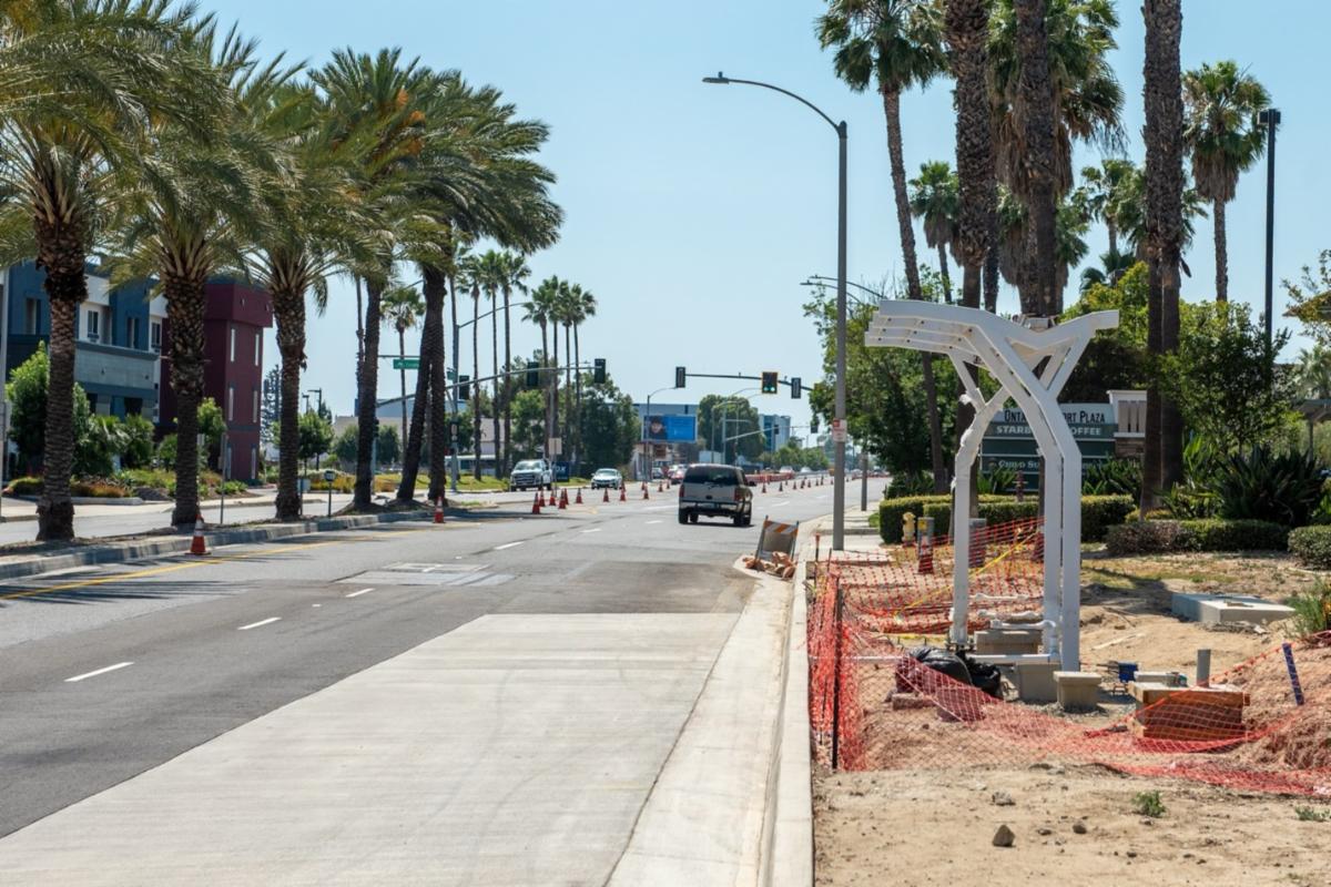 West Valley Connector stations such as this one on Holt Avenue and Vineyard Avenue are being constructed along the 19-mile route.