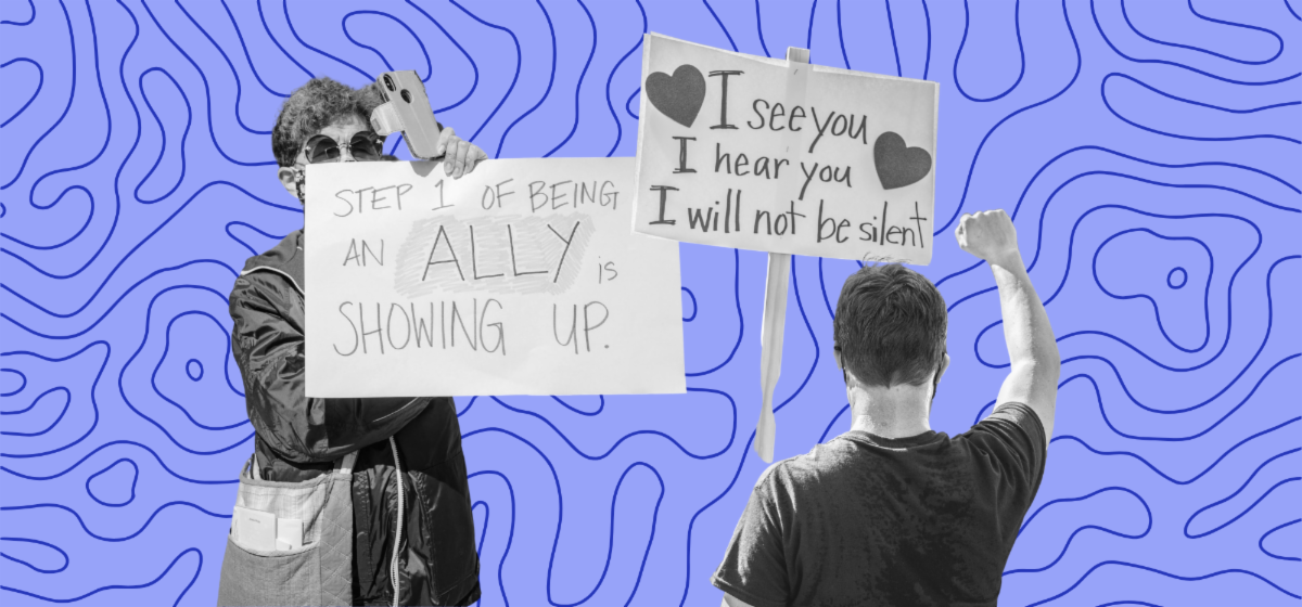 Protestors against a patterned background.