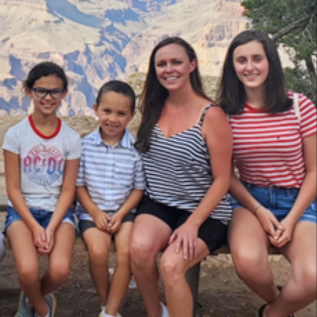Angela and her three children- the people buying a house from Habitat for Humanity.