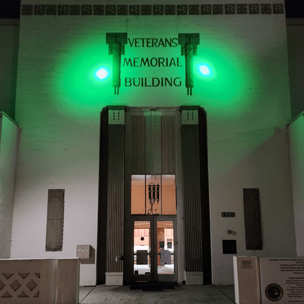 Grass Valley Veterans Hall in Green Light