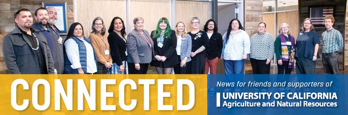 Native American Advisory Council stands with UC ANR leaders in the lobby of the ANR building