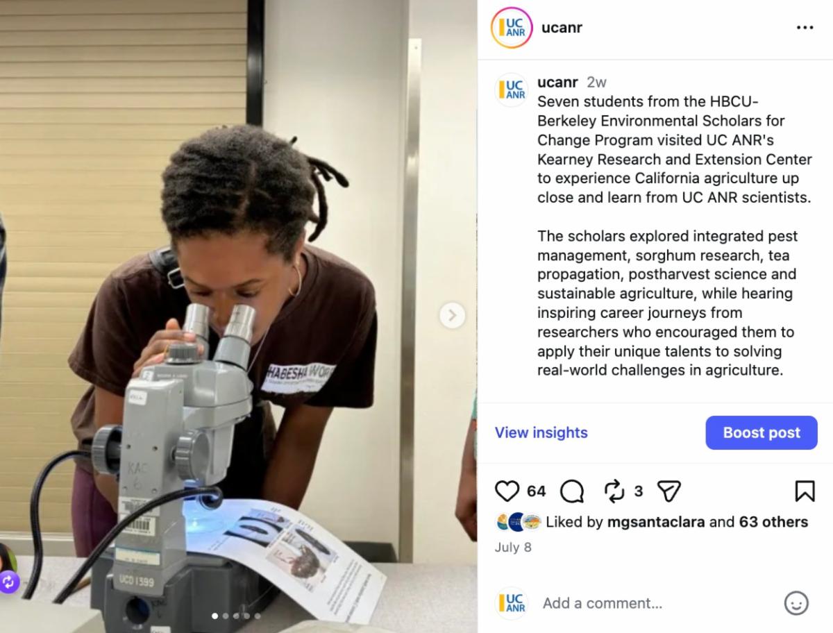 Instagram screenshot showing an HBCU student looking into a microscope during a UC Berkeley program