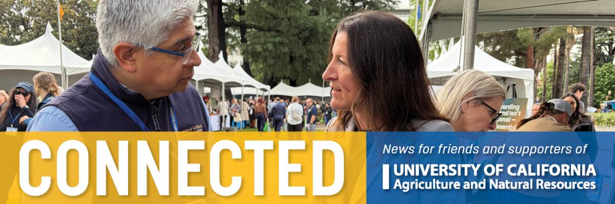 California Assemblymember Cottie Petrie-Norris, at right, confers with UCCE specialist Samuel Sandoval Solis of UC Davis at Ag Day