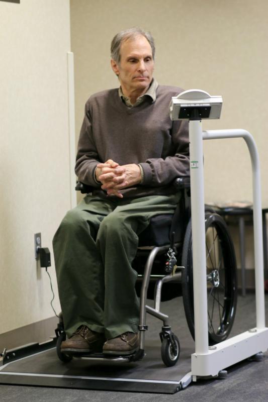 Bob Mikesic using a wheelchair accessible scale