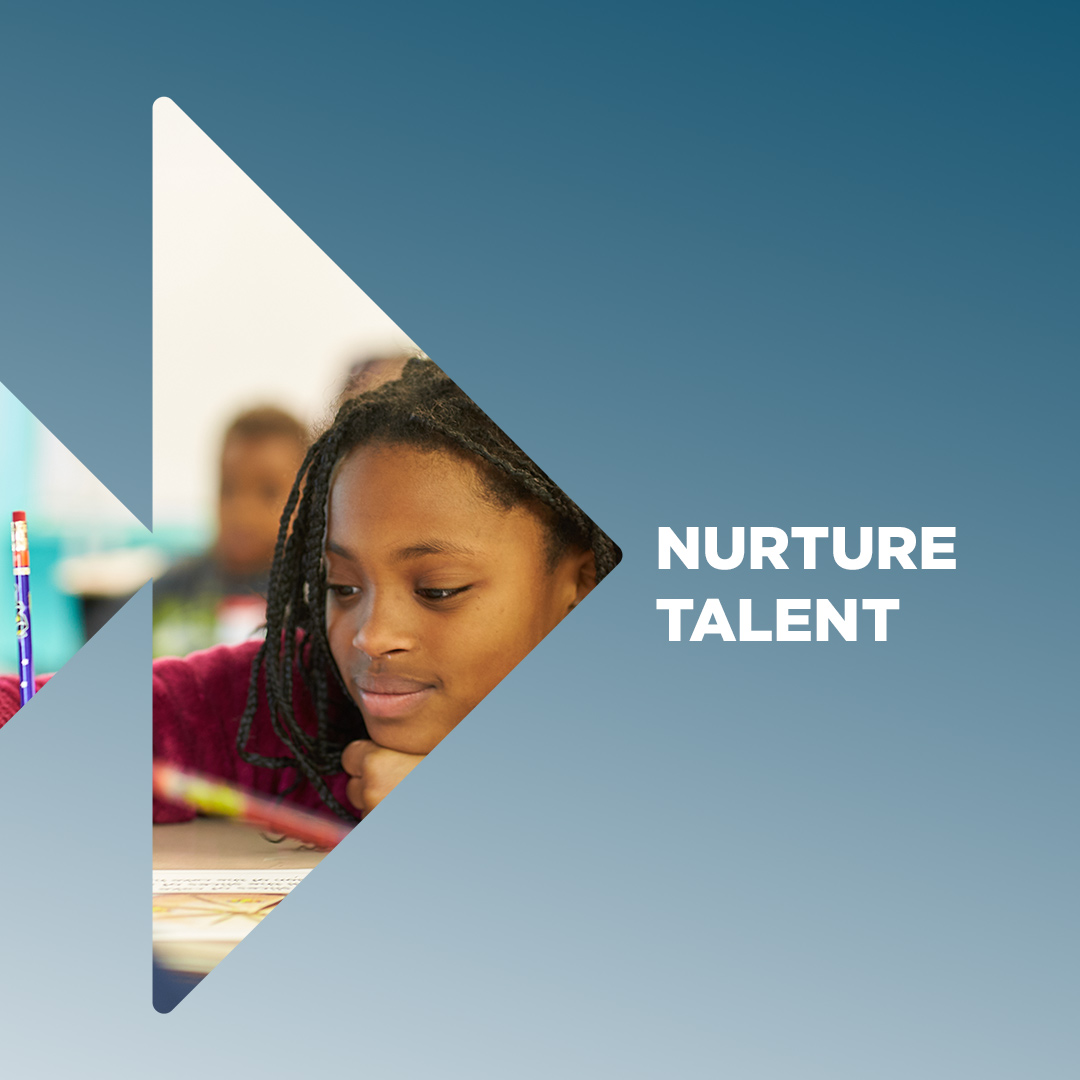 A student at a desk. The image is inside of the Future Forward logo. The words nurture talent next to it.