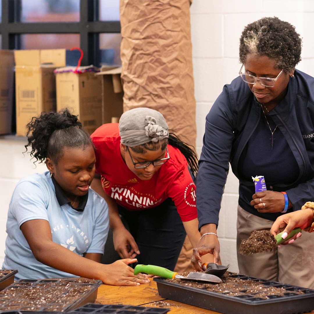 Planting in a classroom at the Jackie Joyner-Kersee Center.