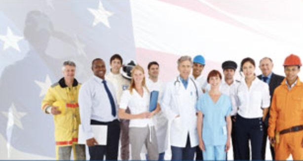 A group of people in work uniforms.