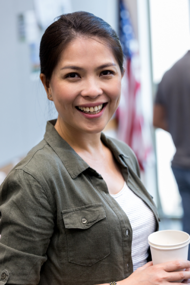 woman veteran smiling at camers
