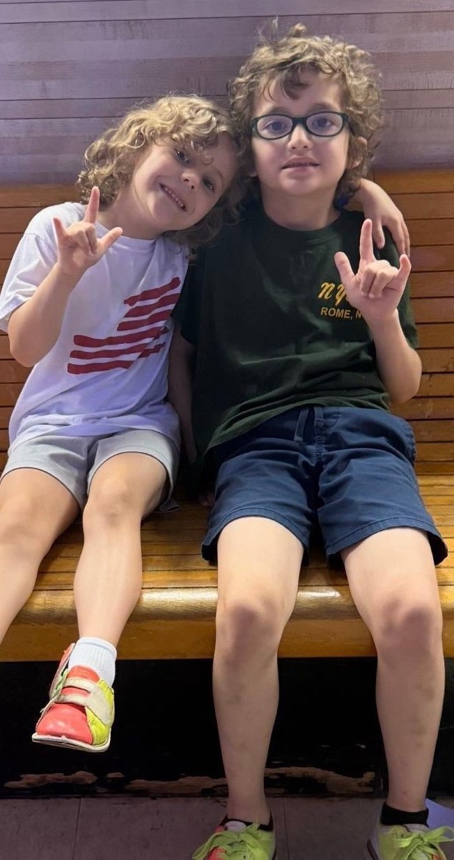 Students posing with peace signs