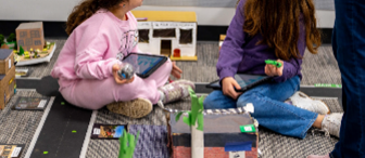 Students in the process of crafting the Hamburg School Village Project