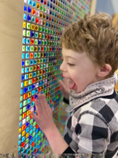 Young student playing with sensory toy