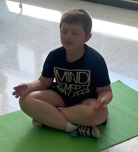Young student meditating
