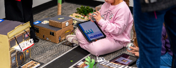 Students in the process of crafting the Hamburg School Village Project