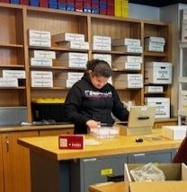 A student at work in the PAES lab