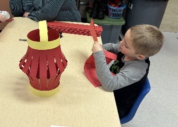 Young student doing arts and crafts