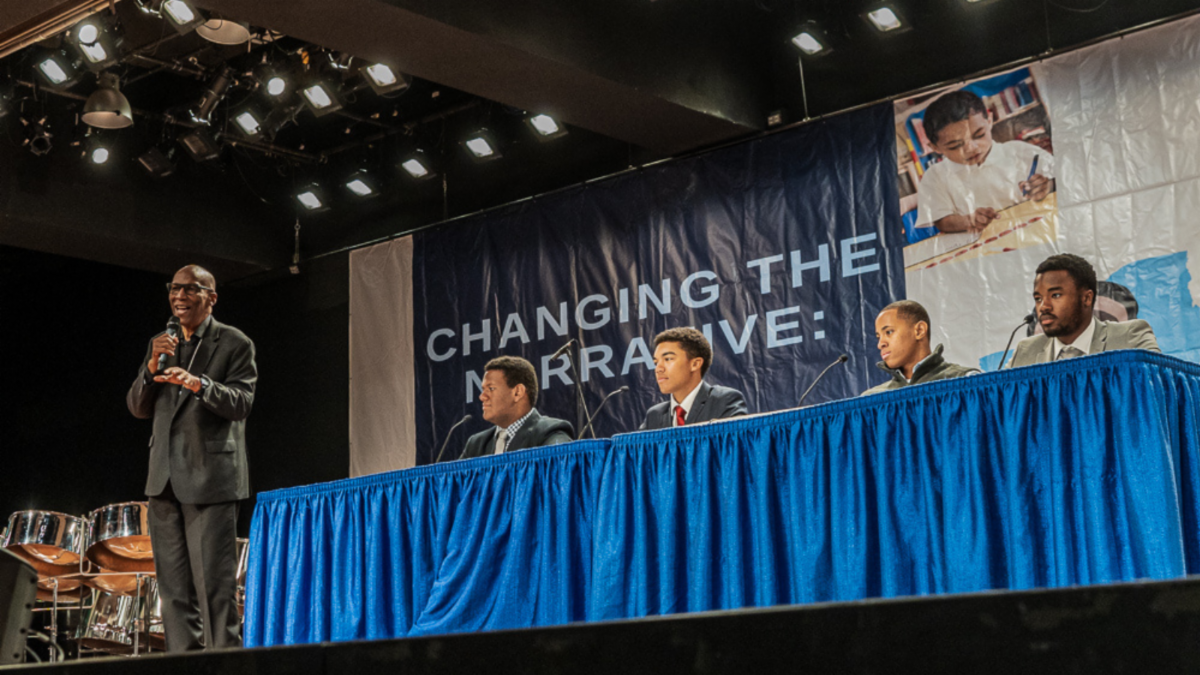 Alfonso Wyatt moderating student panel at 2024 MBK Symposium