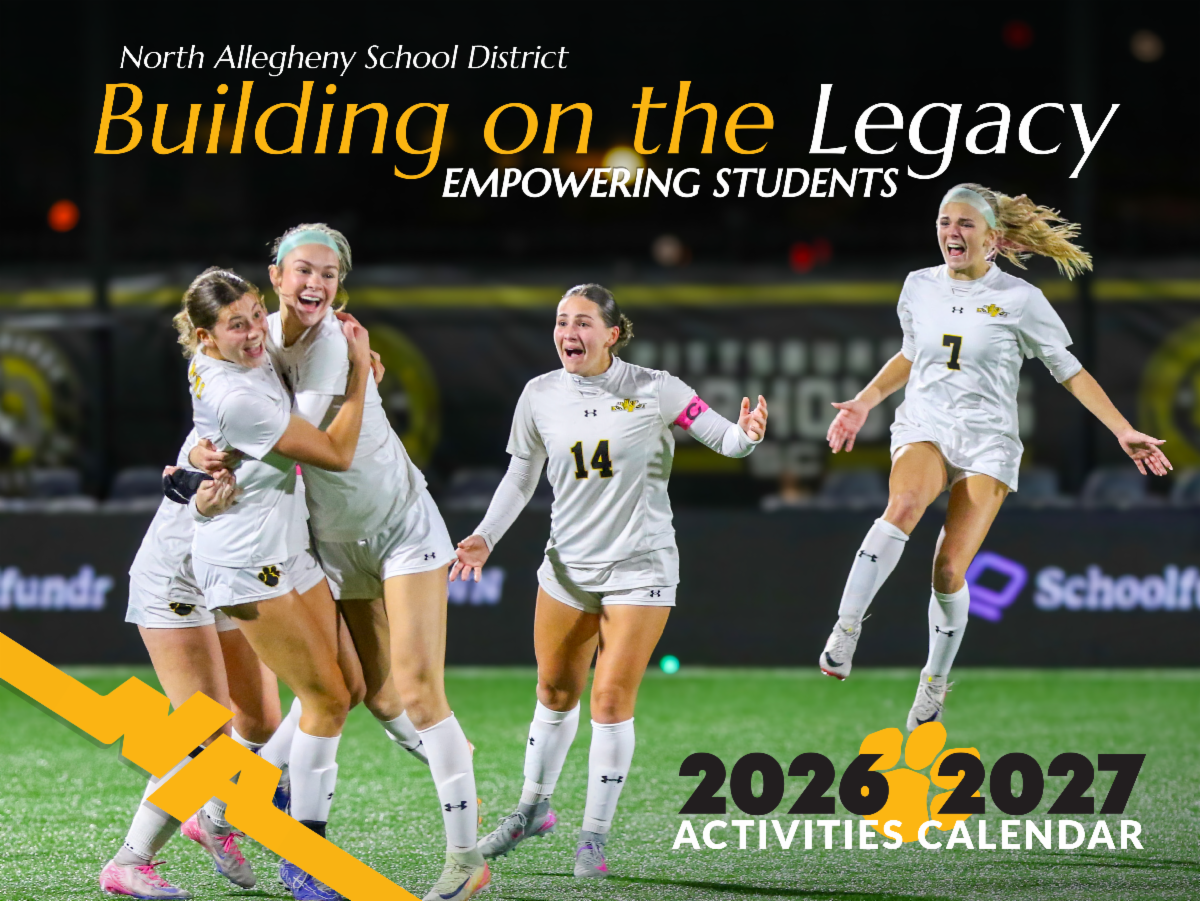 Cover of the North Allegheny School District 2026-2027 Activities Calendar, titled "Building on the Legacy, Empowering Students." The photo features four girls' soccer players in white uniforms celebrating on the field, with one player jumping in mid-air and others embracing with joyful expressions.