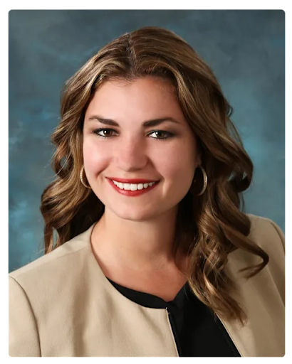 Headshot of Dr. Jenna Fraser, Assistant Principal of Marshall Middle School, smiling in a beige blazer.