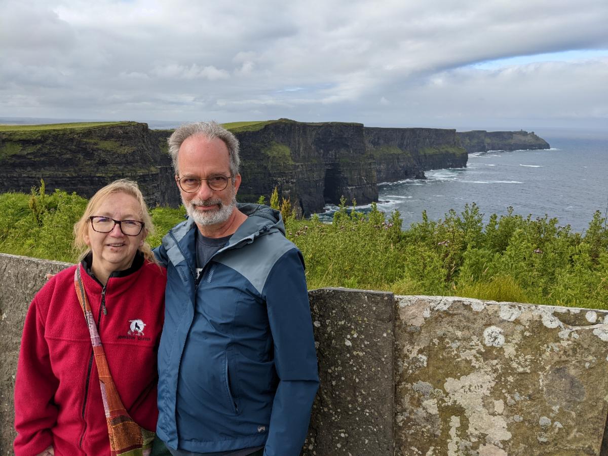 A photo of Kathleen with her husband, Rob, at the Cliffs of Moher in Ireland