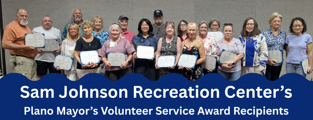 Smiling adults holding Plano Mayor's Volunteer Service Award certificates