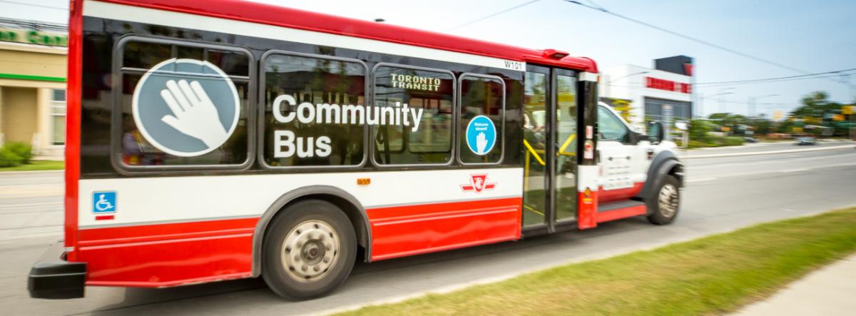 Image of a TTC bus with the Community Bus logo decal on the side