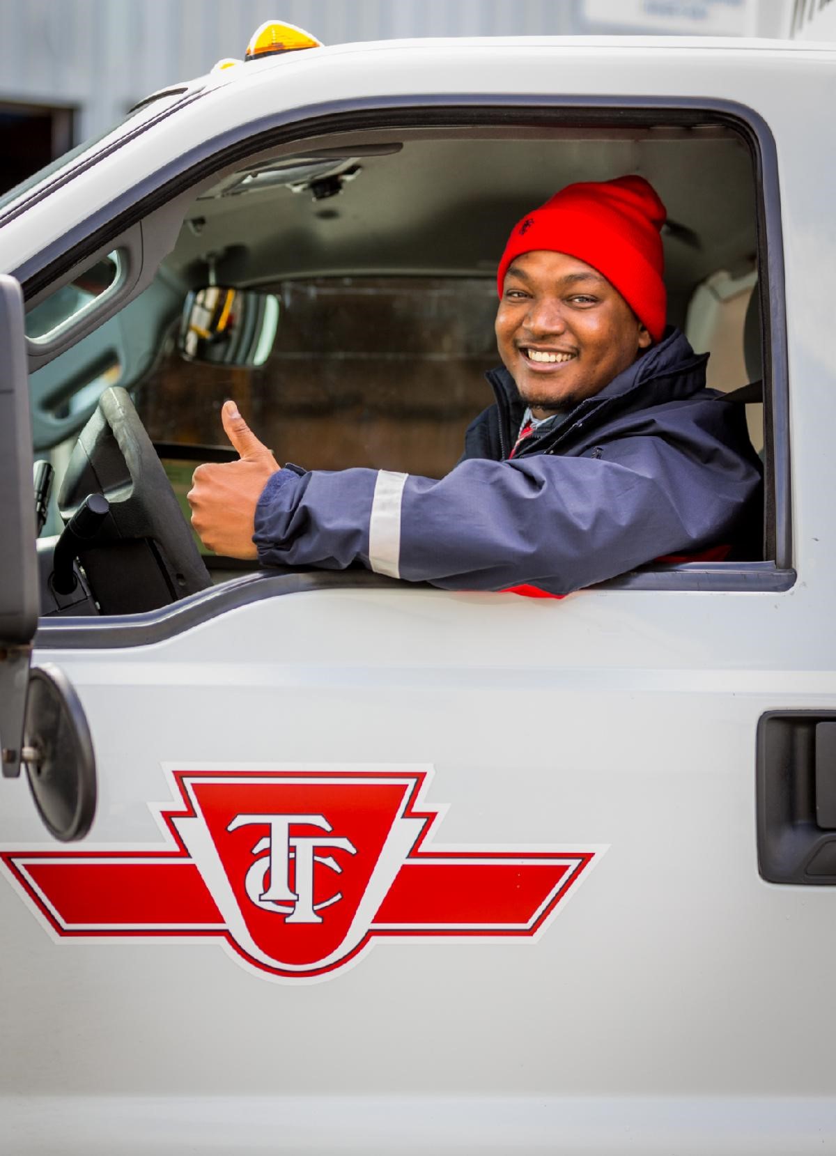 Photo of a wheel-trans driver in a wheel-trans bus