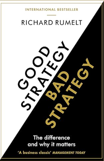The cover of a book titled Good Strategy Bad Strategy by Richard Rumelt. The cover is divided diagonally with the left side white and black text reading GOOD STRATEGY and the right side black with gold text reading BAD STRATEGY. At the top it says INTERNATIONAL BESTSELLER in small gold letters and below that is the author's name Richard Rumelt in larger black letters. At the bottom white text on a black background reads The difference and why it matters followed by a quote in smaller gold text A business classic MANAGEMENT TODAY.