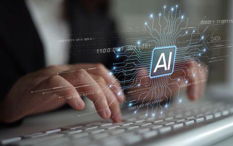 Abtract image of hands on a keyboard overlaid with a graphic of the letters AI