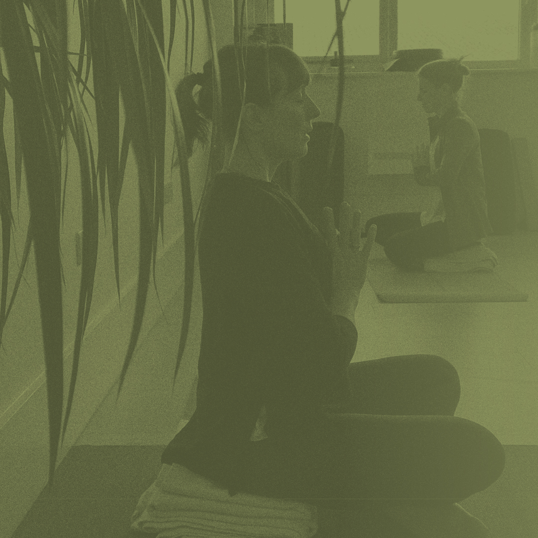 Green filtered image of Jenny-May While teaching at Hereford Yoga Centre