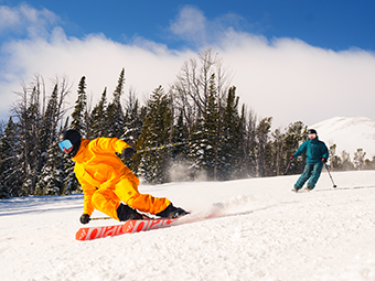 Skiers at Big Sky Resort in Montana