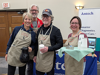 Past presidents serve coffee at VOS 2025 Conference