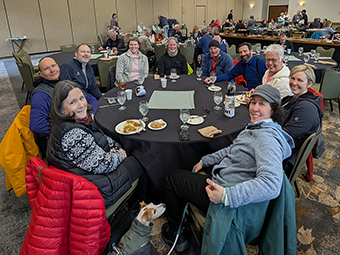 A family skiing at the VOS 2025 Conference in Breckenridge CO