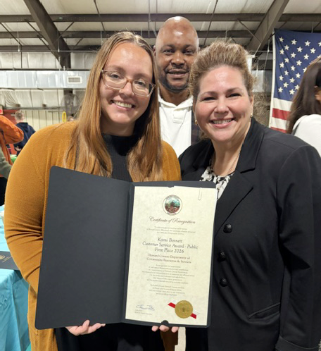 Kami Bennett with Peters Omoregie and Ofelia Ott at the Employee Recognition Awards