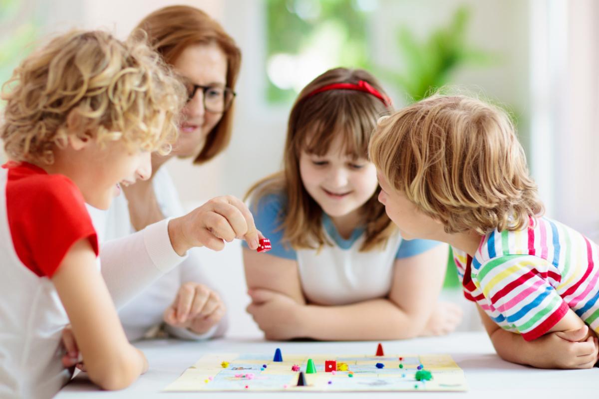 Family playing a board game
