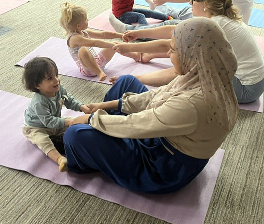 Mother and child yoga class at the Family Support Center