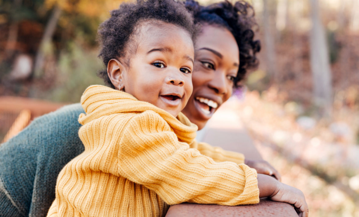 A mother and child together outdoors